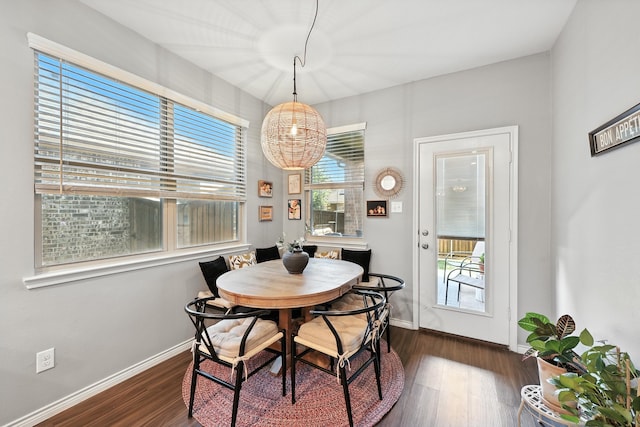 2136 Miramar Dr, Little Elm, TX 75068 - dining space with dark wood-style floors and a chandelier