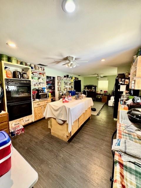 2025 16th St, Garland, TX 75041 - bedroom featuring dark wood finished floors