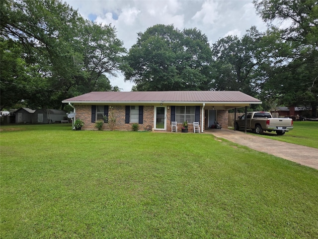 512 W Nevada Ave, Vivian, LA 71082 - ranch-style house featuring concrete driveway, an attached carport, a metal roof, a front lawn, and brick siding