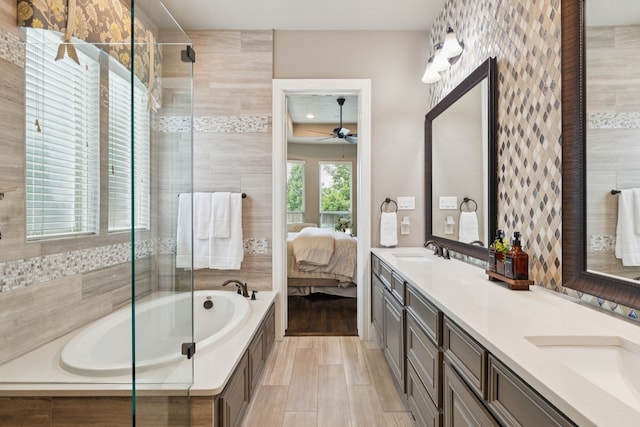 2824 Mastil Rd, Grand Prairie, TX 75054 - bathroom with a bath, double vanity, a ceiling fan, and tiled shower