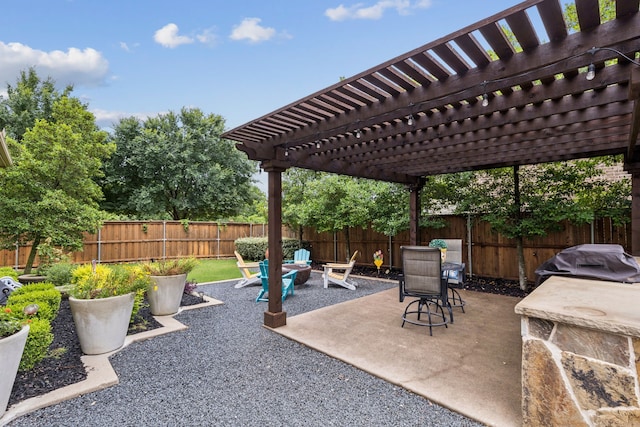 2824 Mastil Rd, Grand Prairie, TX 75054 - fenced backyard featuring area for grilling, a pergola, and a patio