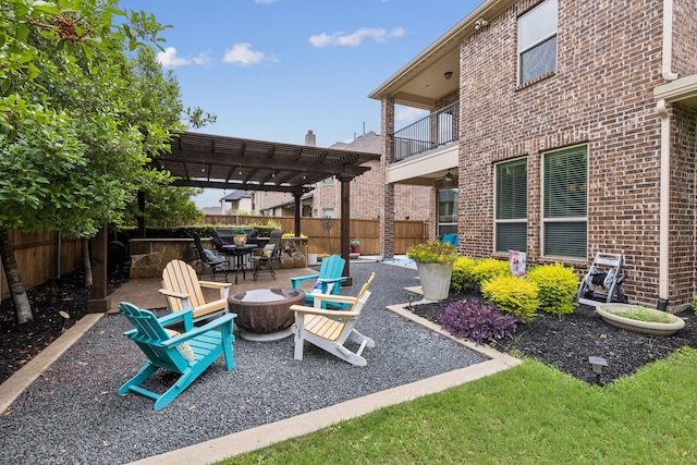 2824 Mastil Rd, Grand Prairie, TX 75054 - patio / terrace with a fire pit, a pergola, outdoor dining space, and a patio area