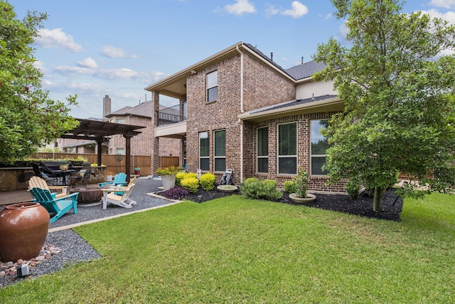 2824 Mastil Rd, Grand Prairie, TX 75054 - back of house featuring brick siding, a balcony, a patio, a fire pit, and a pergola