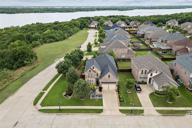 2824 Mastil Rd, Grand Prairie, TX 75054 - aerial perspective of suburban area with a large body of water