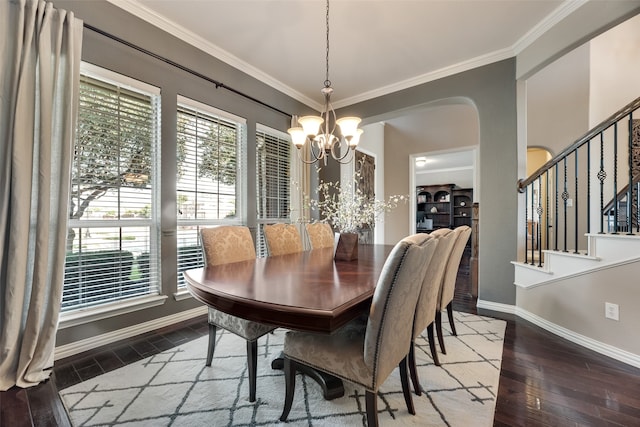 12517 Peace River Dr, Frisco, TX 75035 - dining area with a chandelier, wood-type flooring, ornamental molding, stairway, and arched walkways