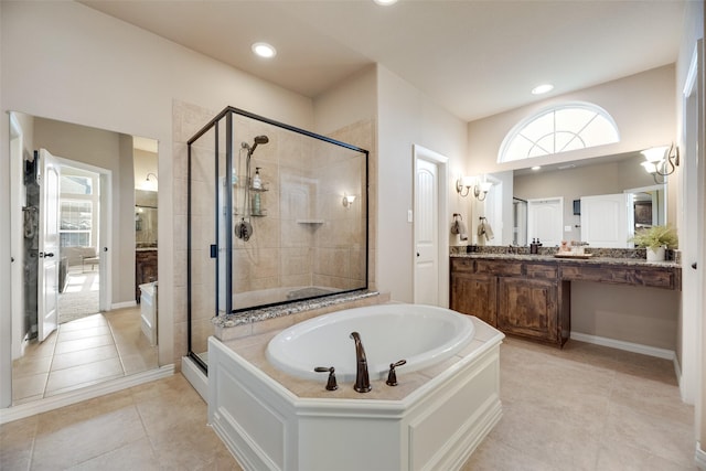 12517 Peace River Dr, Frisco, TX 75035 - full bath featuring a bath, a stall shower, vanity, tile patterned floors, and recessed lighting