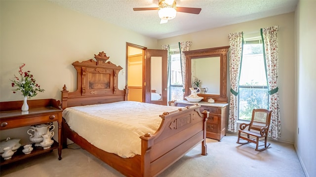 3 Cimarron Dr, Trophy Club, TX 76262 - bedroom featuring a textured ceiling, light carpet, and ceiling fan