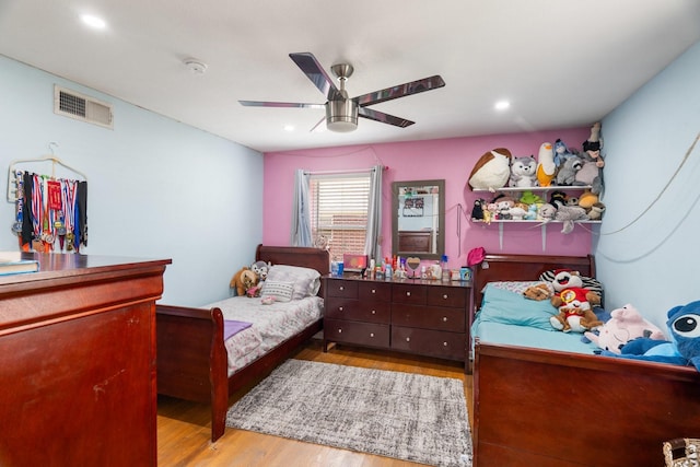 2008 Morningside Dr, Garland, TX 75041 - bedroom featuring wood finished floors, ceiling fan, and recessed lighting