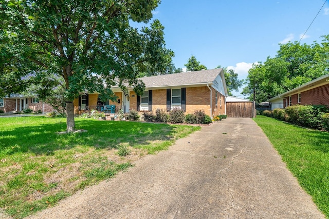 2008 Morningside Dr, Garland, TX 75041 - single story home with driveway, brick siding, a porch, and a shingled roof