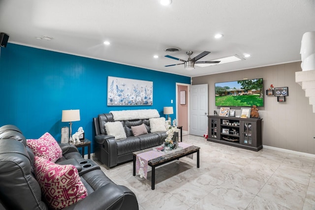 2008 Morningside Dr, Garland, TX 75041 - living area with a ceiling fan, recessed lighting, ornamental molding, and an accent wall