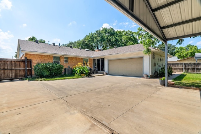 2008 Morningside Dr, Garland, TX 75041 - view of front of house with a garage, driveway, and brick siding