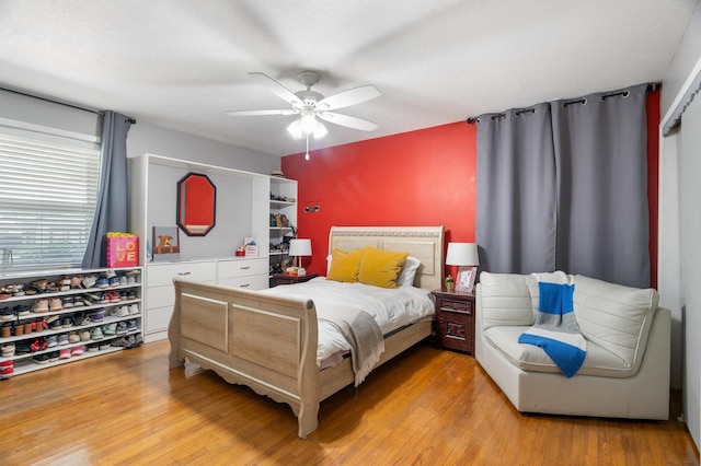 2008 Morningside Dr, Garland, TX 75041 - bedroom featuring light wood-type flooring and a ceiling fan
