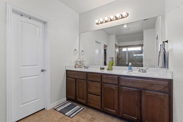 104 Knoll Ln, Decatur, TX 76234 - full bath featuring double vanity, a shower stall, and tile patterned flooring