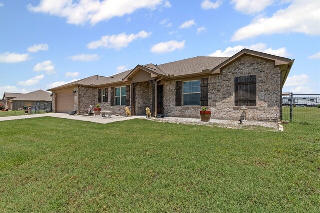 104 Knoll Ln, Decatur, TX 76234 - ranch-style home with a garage, driveway, brick siding, and roof with shingles