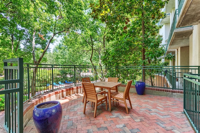 5055 Addison Cir Unit 413, Addison, TX 75001 - view of patio / terrace with outdoor dining space