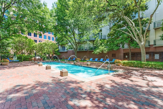 5055 Addison Cir Unit 413, Addison, TX 75001 - community pool with a patio