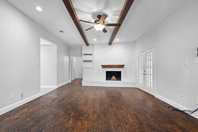 7422 Foxworth Dr, Dallas, TX 75248 - unfurnished living room featuring a ceiling fan, beamed ceiling, a fireplace, recessed lighting, and wood finished floors