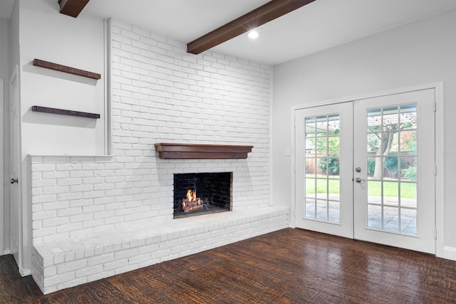 7422 Foxworth Dr, Dallas, TX 75248 - unfurnished living room featuring beam ceiling, french doors, wood finished floors, and a brick fireplace