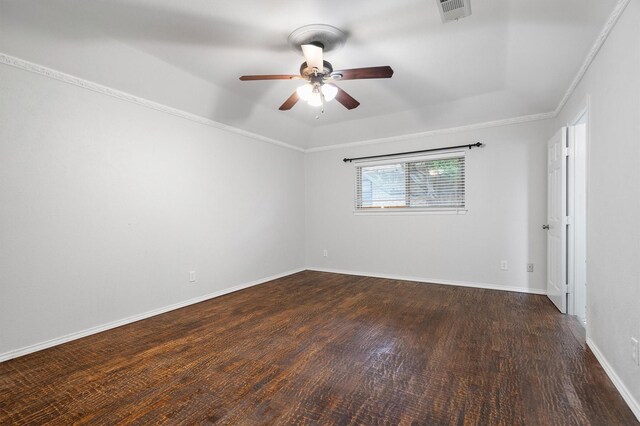 7422 Foxworth Dr, Dallas, TX 75248 - unfurnished room featuring a ceiling fan, dark wood-style flooring, ornamental molding, and a raised ceiling