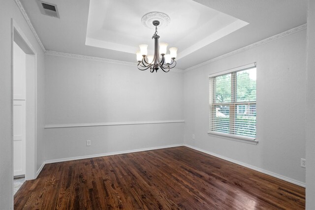 7422 Foxworth Dr, Dallas, TX 75248 - spare room with a tray ceiling, a chandelier, wood finished floors, and ornamental molding