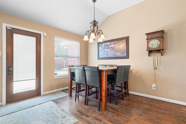 2912 Day Star Dr, Little Elm, TX 75068 - dining area featuring a chandelier, lofted ceiling, and wood finished floors