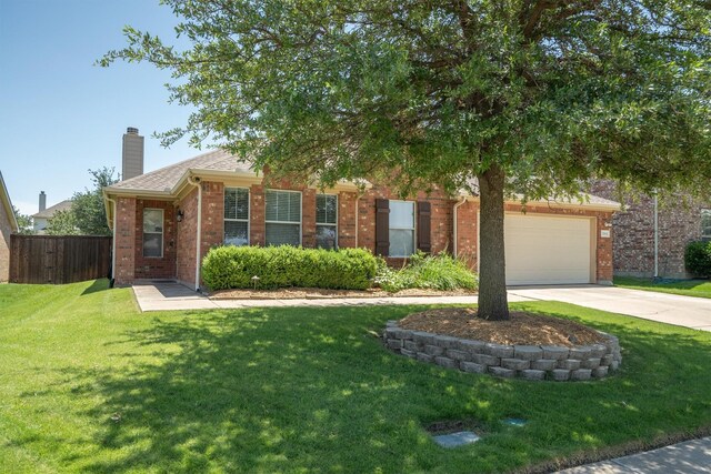 2912 Day Star Dr, Little Elm, TX 75068 - obstructed view of property with brick siding, concrete driveway, a chimney, and an attached garage