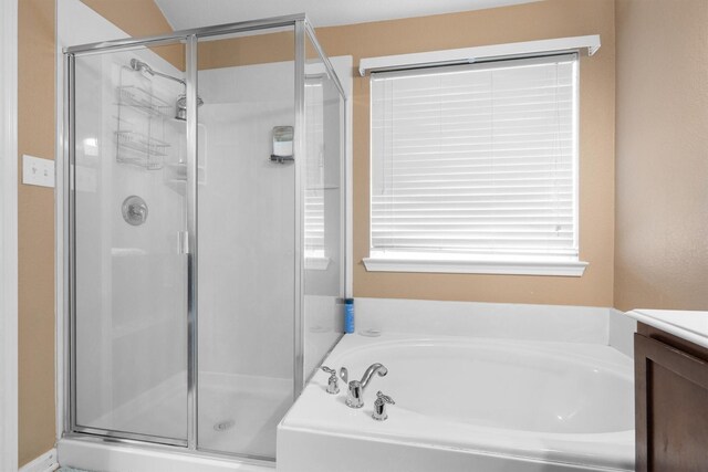2912 Day Star Dr, Little Elm, TX 75068 - full bathroom featuring a shower stall, a bath, and vanity
