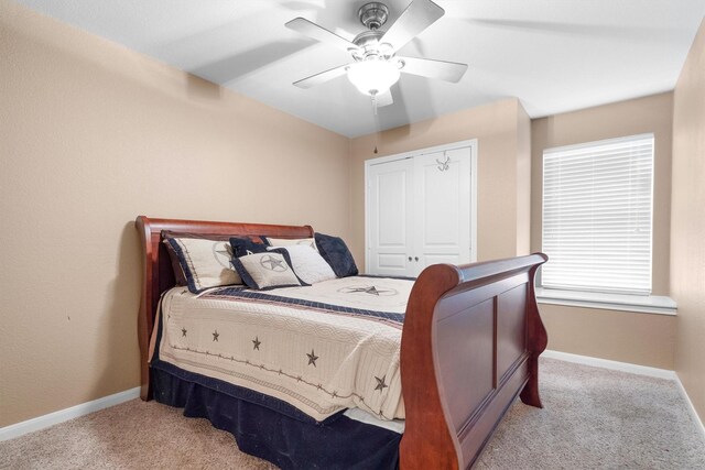 2912 Day Star Dr, Little Elm, TX 75068 - bedroom featuring light colored carpet, ceiling fan, and a closet