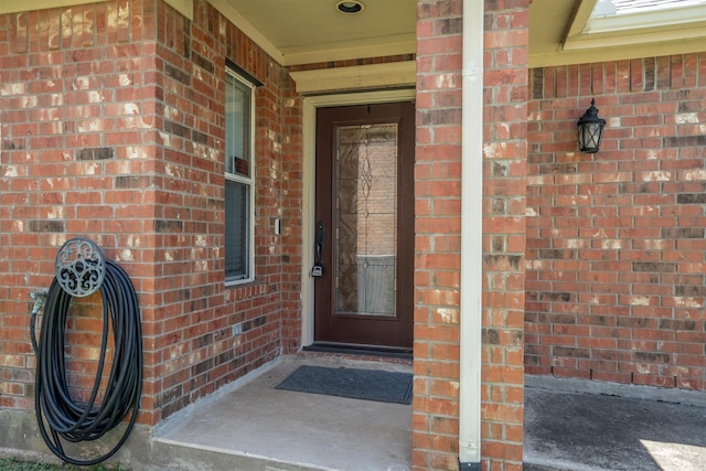 2912 Day Star Dr, Little Elm, TX 75068 - view of exterior entry featuring brick siding