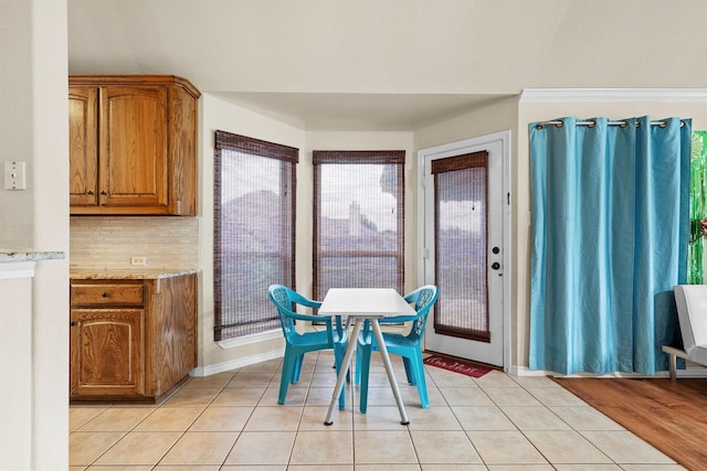 12313 Ark Rd, Frisco, TX 75035 - dining room with light tile patterned floors