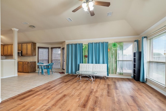 12313 Ark Rd, Frisco, TX 75035 - living room with lofted ceiling, ceiling fan, and light wood-type flooring