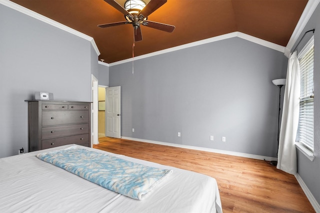 12313 Ark Rd, Frisco, TX 75035 - bedroom featuring wood finished floors, lofted ceiling, ceiling fan, and ornamental molding