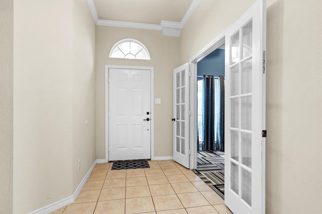 12313 Ark Rd, Frisco, TX 75035 - entryway featuring ornamental molding and light tile patterned floors