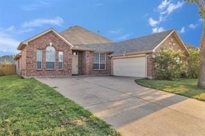 831 Fair Oaks Dr, Grand Prairie, TX 75052 - single story home featuring driveway, an attached garage, and brick siding