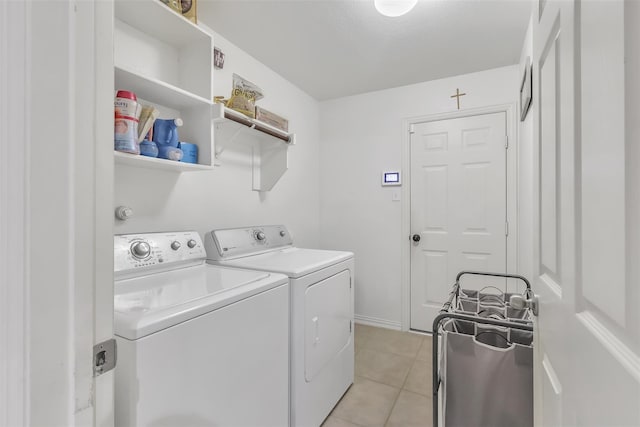 831 Fair Oaks Dr, Grand Prairie, TX 75052 - washroom featuring washing machine and dryer and light tile patterned flooring