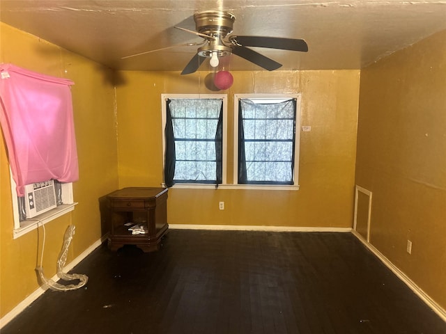 2806 Twyman, Dallas, TX 75215 - spare room featuring ceiling fan and wood finished floors