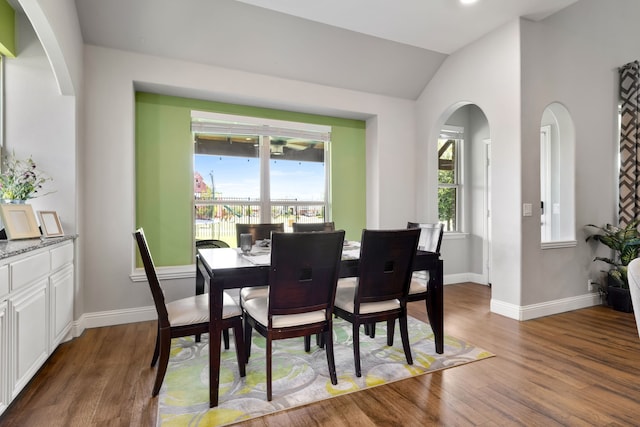 405 Milford, Wylie, TX 75098 - dining room with arched walkways, lofted ceiling, and wood finished floors
