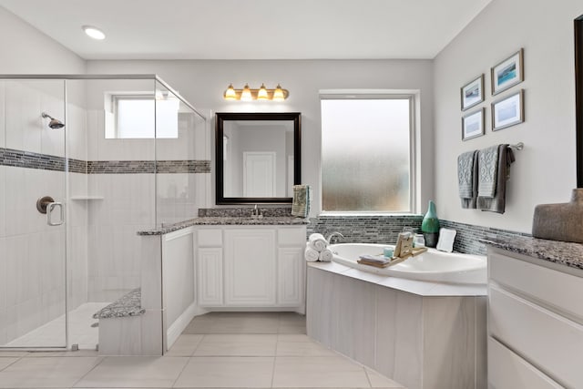 405 Milford, Wylie, TX 75098 - bathroom with a shower stall, a bath, vanity, and tile patterned flooring