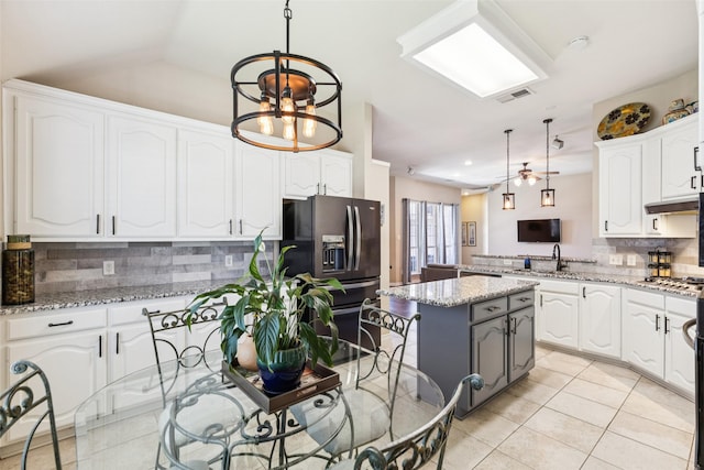 3718 Colonnade Grove Dr, Frisco, TX 75033 - kitchen featuring refrigerator with ice dispenser, tasteful backsplash, white cabinets, and light tile patterned floors