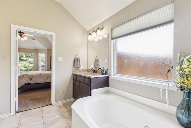3718 Colonnade Grove Dr, Frisco, TX 75033 - ensuite bathroom with lofted ceiling, a garden tub, vanity, a ceiling fan, and tile patterned floors