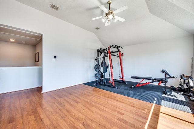 8224 Spring Valley Ln, Plano, TX 75025 - exercise area with lofted ceiling, ceiling fan, and wood finished floors