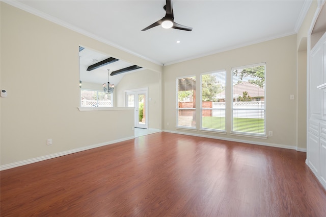 5853 Echo Bluff Dr, Haltom City, TX 76137 - empty room with ceiling fan, wood finished floors, ornamental molding, and a chandelier