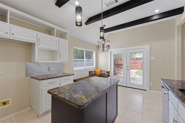 5853 Echo Bluff Dr, Haltom City, TX 76137 - kitchen with french doors, a chandelier, light tile patterned flooring, a kitchen island, and dark stone countertops