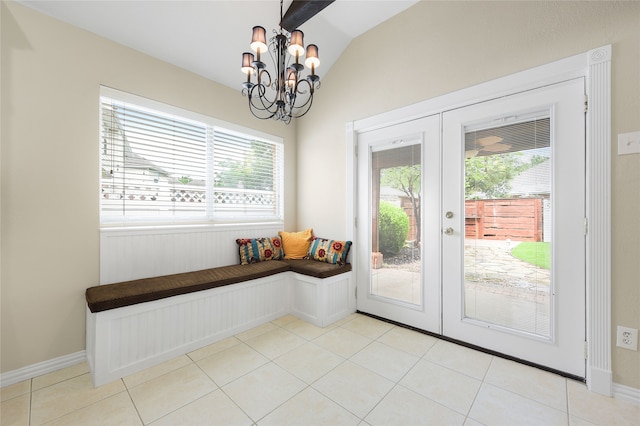 5853 Echo Bluff Dr, Haltom City, TX 76137 - doorway to outside with french doors, lofted ceiling, a chandelier, and light tile patterned floors