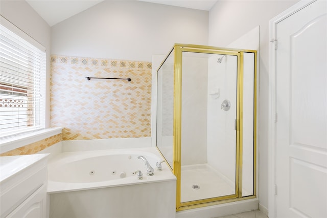 5853 Echo Bluff Dr, Haltom City, TX 76137 - bathroom featuring a shower stall, a whirlpool tub, healthy amount of natural light, and lofted ceiling