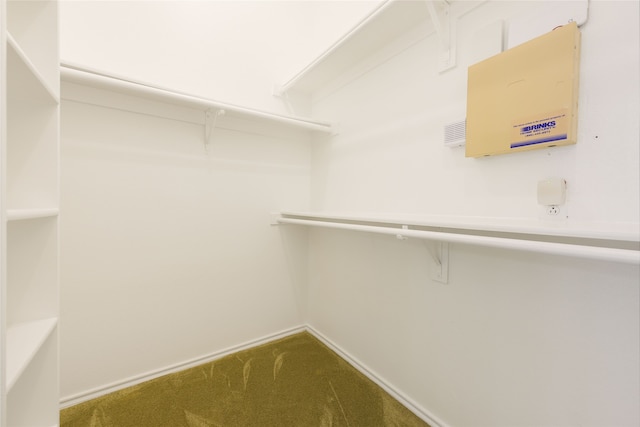 5853 Echo Bluff Dr, Haltom City, TX 76137 - spacious closet featuring dark carpet