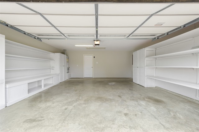 5853 Echo Bluff Dr, Haltom City, TX 76137 - garage featuring a garage door opener
