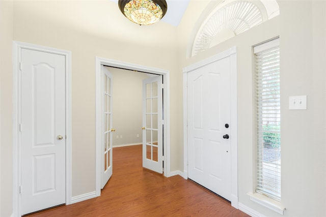5853 Echo Bluff Dr, Haltom City, TX 76137 - foyer entrance featuring light wood-type flooring and french doors
