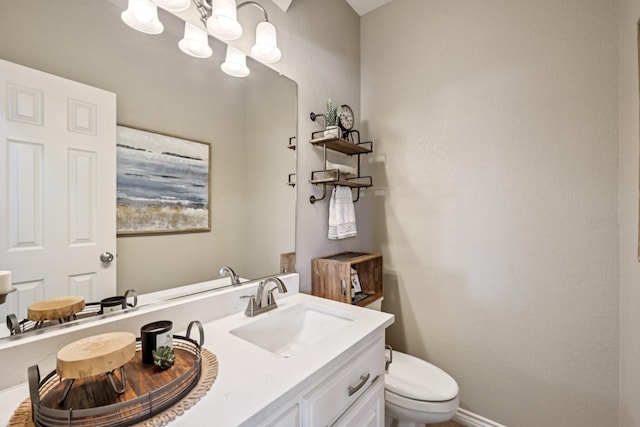 3707 Elizabeth Dr, Carrollton, TX 75007 - bathroom featuring toilet and vanity