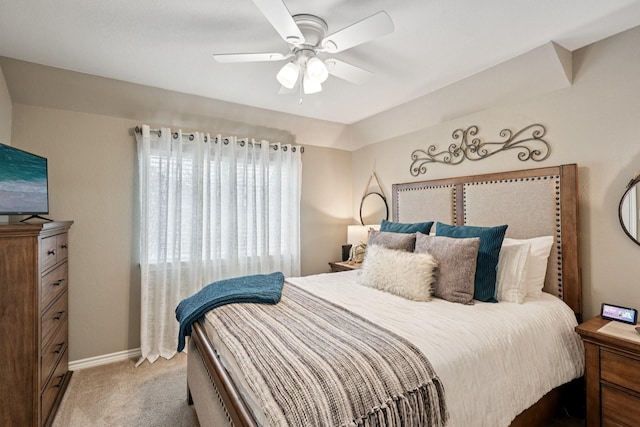 3707 Elizabeth Dr, Carrollton, TX 75007 - bedroom with light colored carpet and a ceiling fan